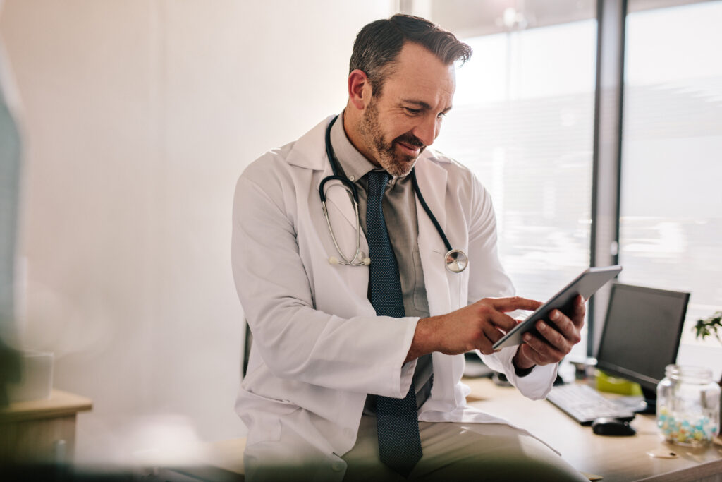 Healthcare professional utilizing technology to save costs