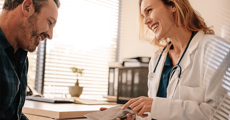 Provider and patient discussing treatment progress