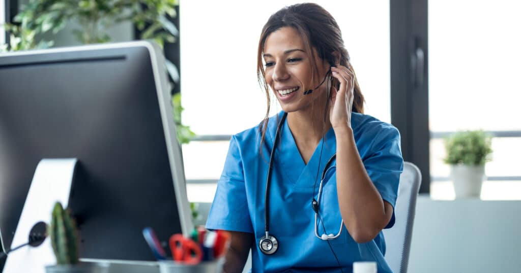A healthcare administrator setting up an electronic health record (EHR) system for improved patient engagement