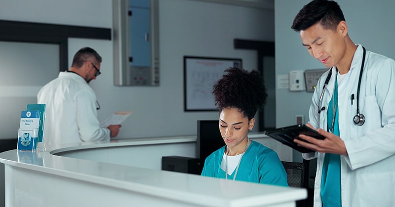 “Medical staff collaborating using digital communication tools