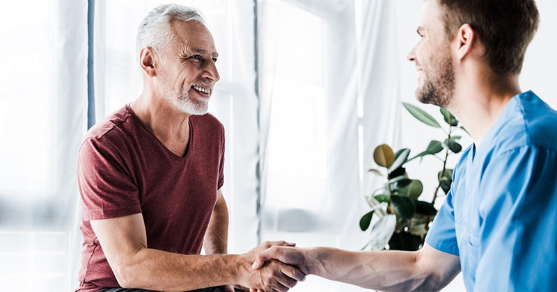 Nurse supporting a patient with a compassionate approach