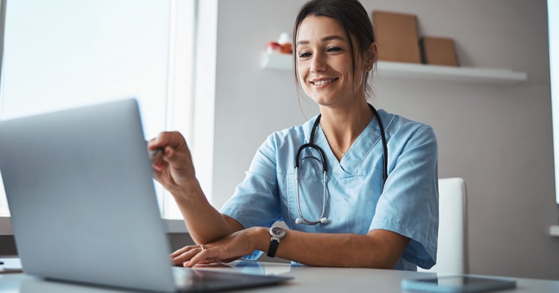 Healthcare professional assisting patient at clinic