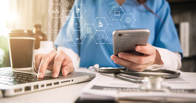 Healthcare professional using AI for ICD code accuracy.