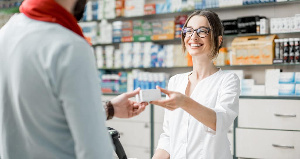 Pharmacy staff using electronic prescription service
