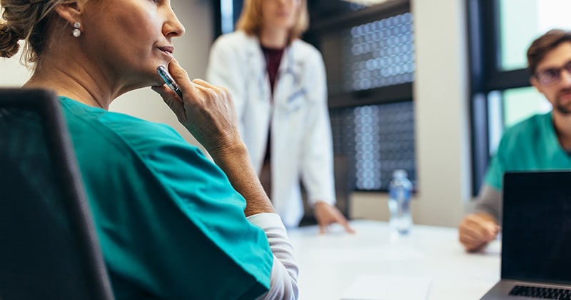 Medical team discussing healthcare workforce challenges