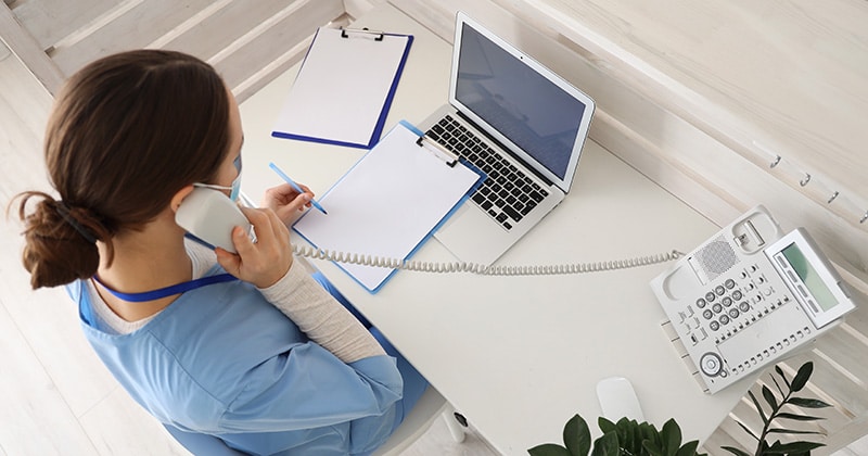 Doctor using technology to streamline workflow
