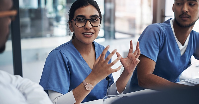 Healthcare professionals collaborating to improve efficiency