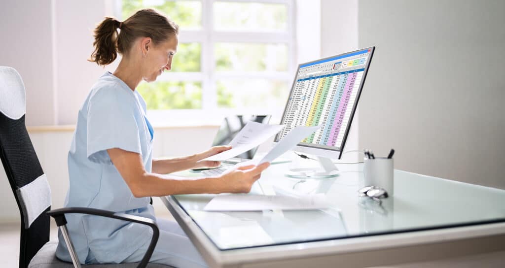 Medical billing professional entering charge capture data